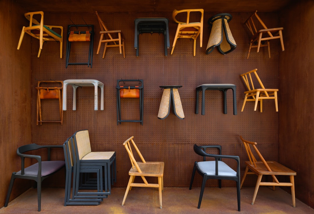 a-room-filled-with-lots-of-different-types-of-chairs-15w1vw-zani